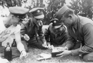 ?, Bill Garrity, ? & Bill Knowles shooting Craps C.A.A.B. 1943